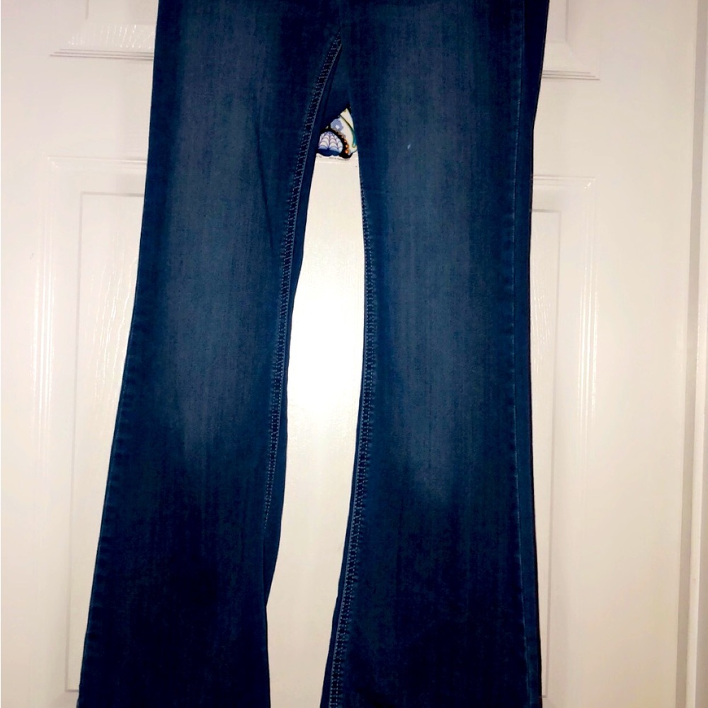 Bellbottom blue jeans.